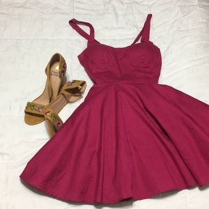 Pink skater/peplum cocktail dress